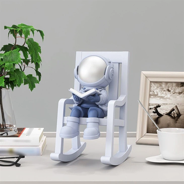 Astronaut in Rocking Chair Figurine