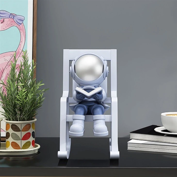 Astronaut in Rocking Chair Figurine